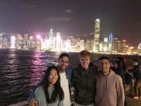 Felix (second from right) and his friends at Tsim Sha Tsui Promenade at night